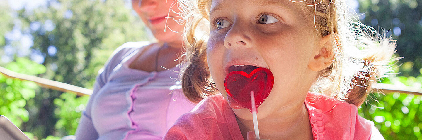 little girl with a lollipop