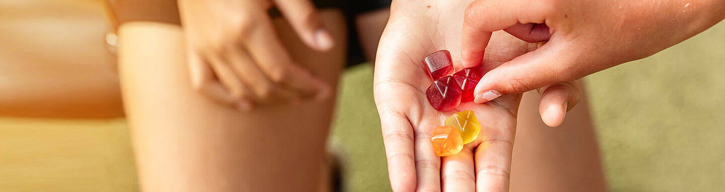 hand with gummies