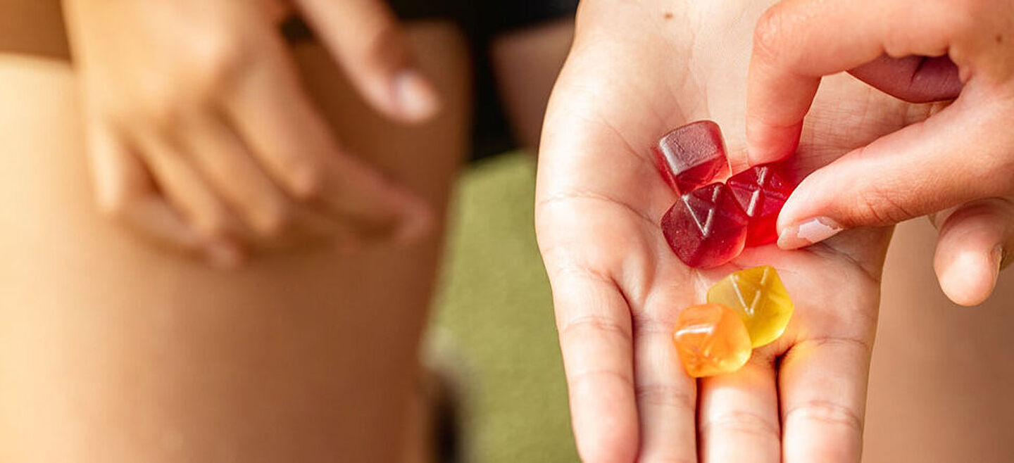 hand with gummies