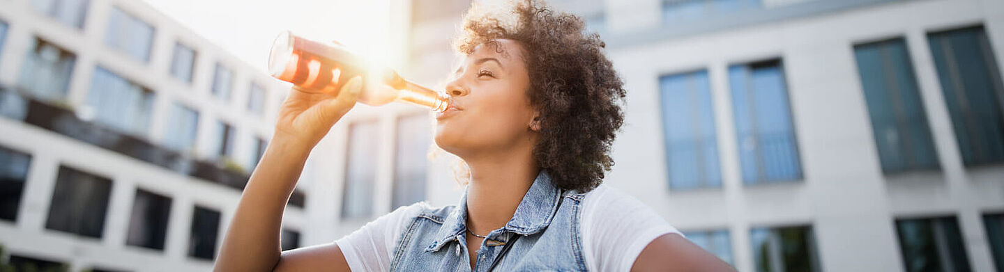 girl drinking carbonated soft drinks