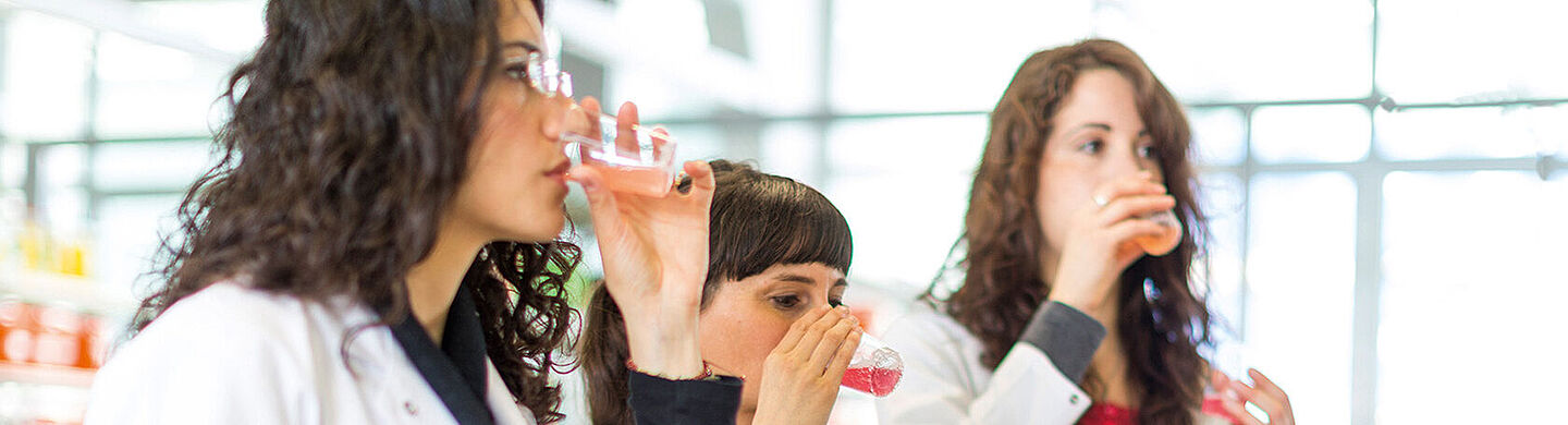 workers tasting some liquids