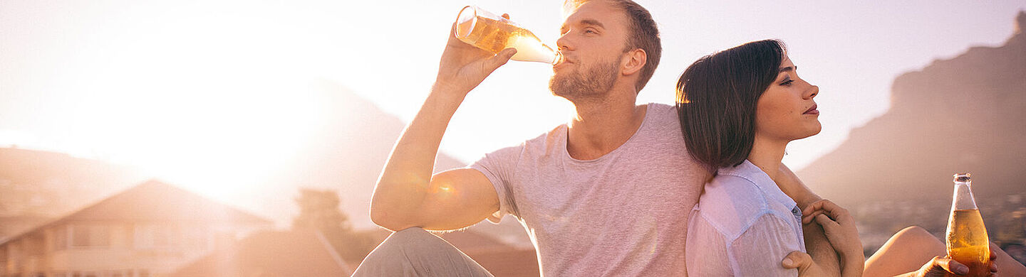 couple drinking malt drinks