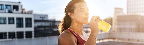 Woman drinking from a bottle