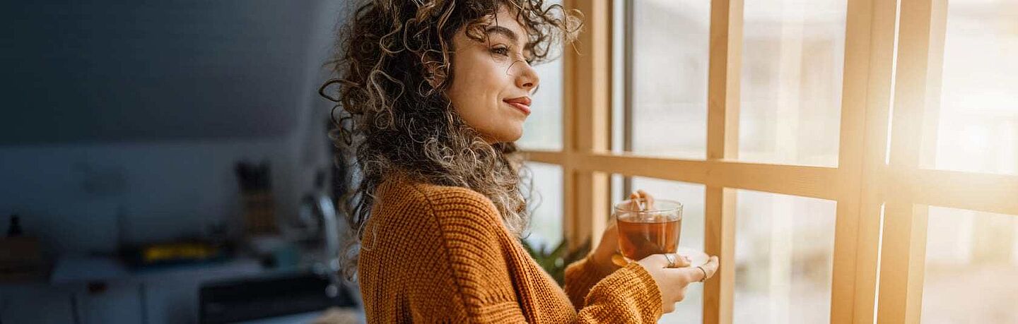 Woman drinking kombucha