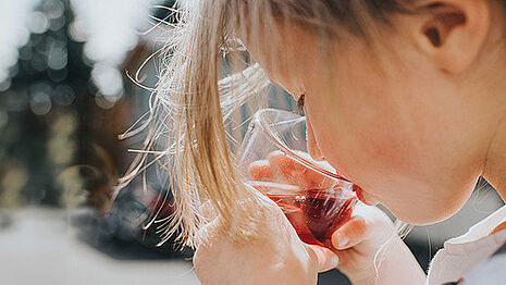 girl drinking a juice