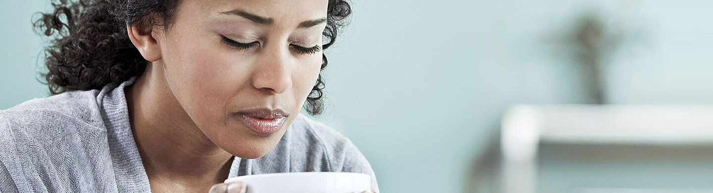 woman with a cup of tea