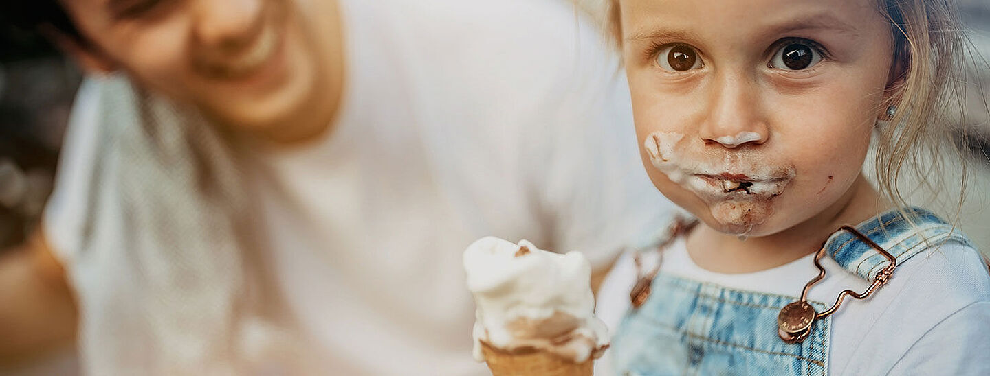 little girl eating an ice cream