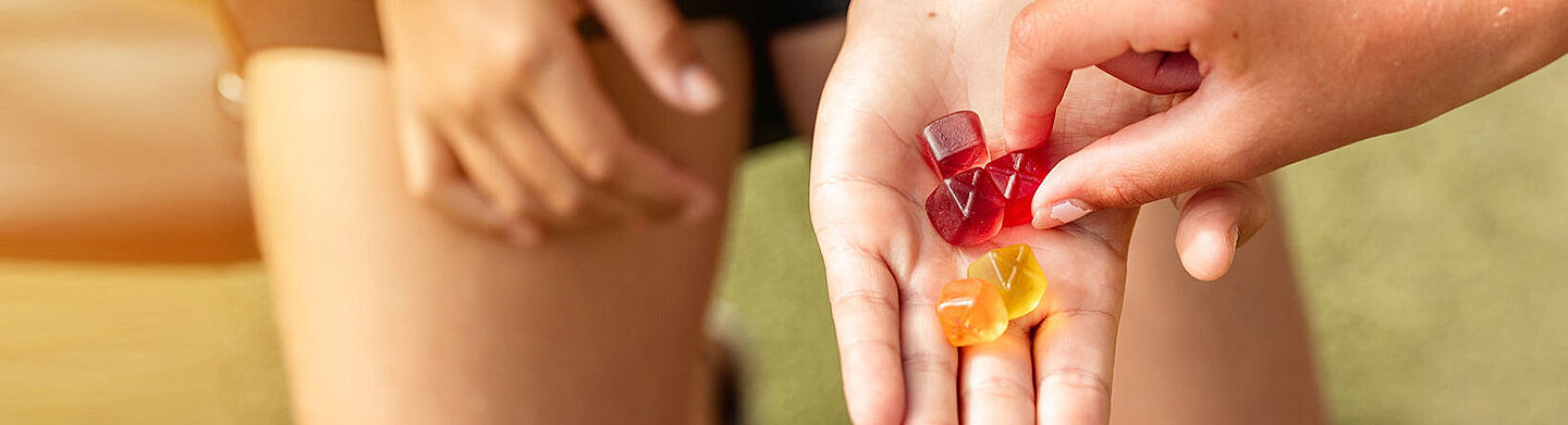 hand with gummies