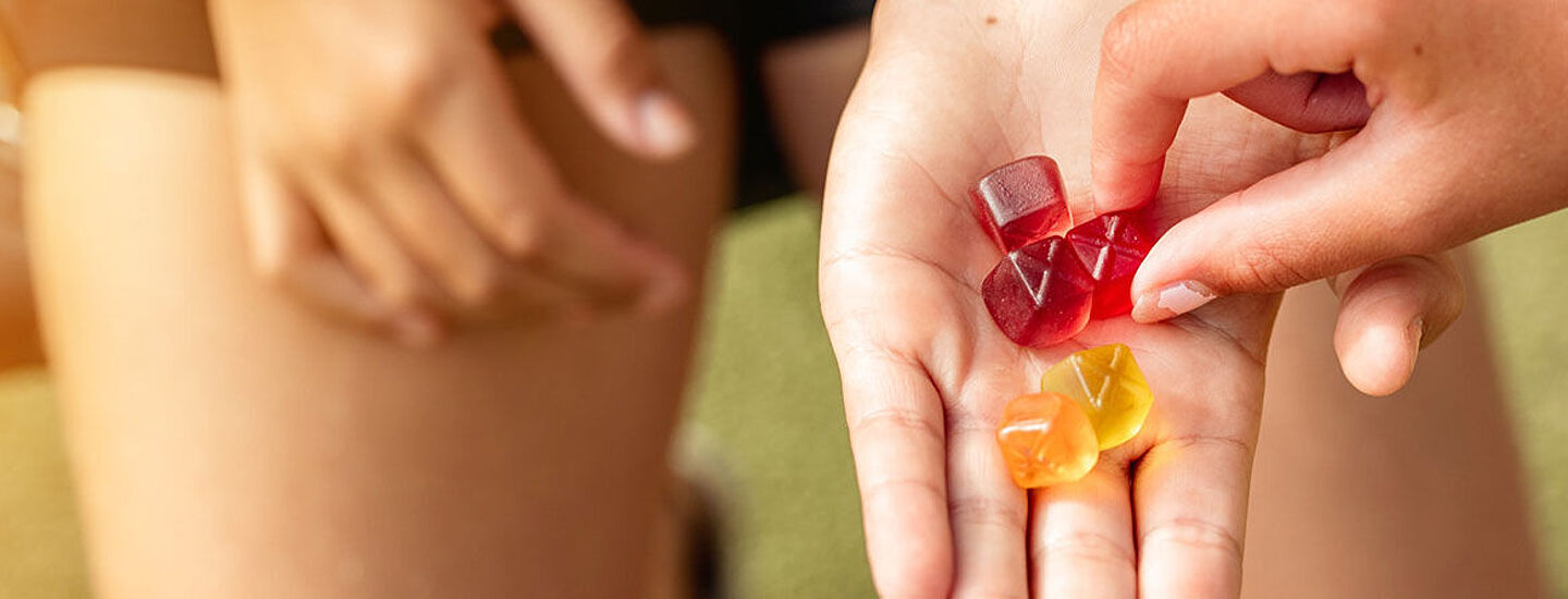 hand with gummies