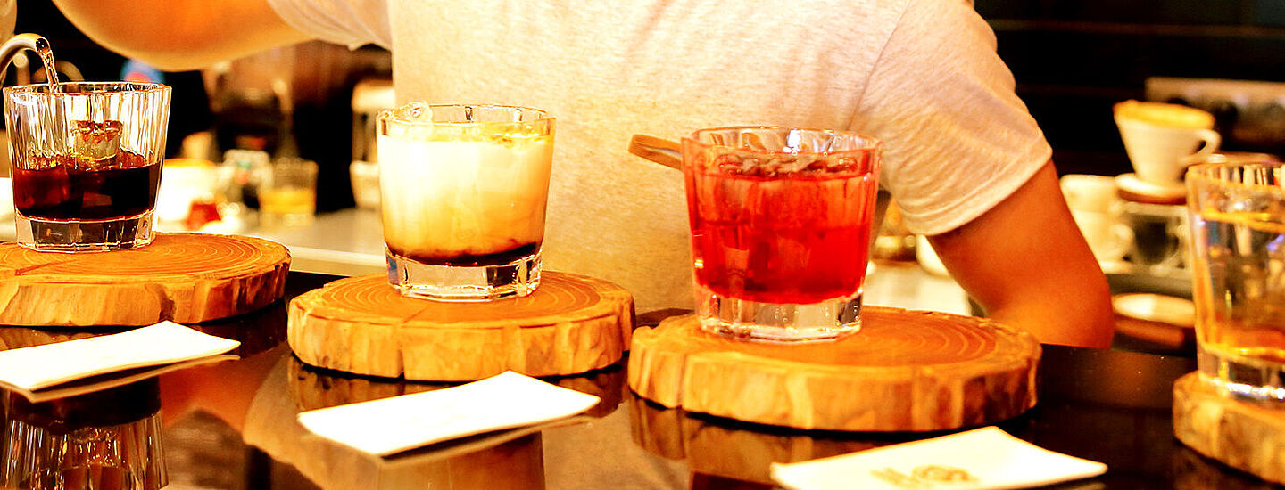 drinks on a wood glass holder