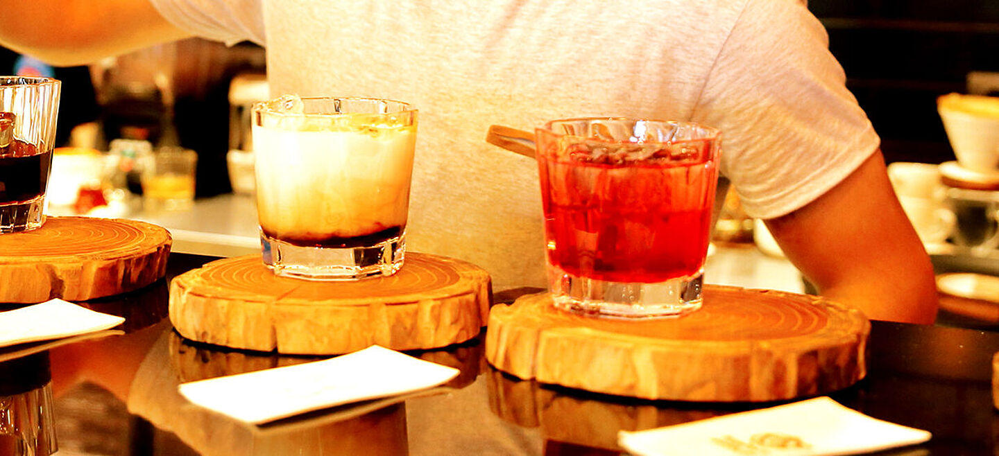 drinks on a wood glass holder